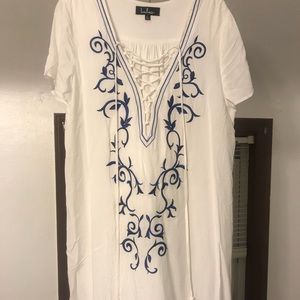 Lulu's Dresses - Lulu’s White lace up dress Lulu's Dresses - Lulu’s White lace up dress